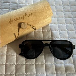 Johnny Fly Apache Matte black aviator smoke polarized lenses.